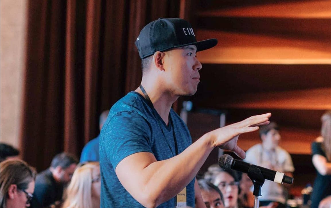 Mike Ke speaking about dating with social media at a confidence conference